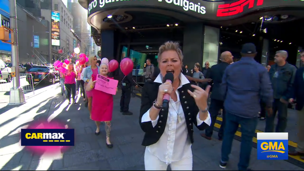 Anita performing Fight Like A Girl outside of the GMA studio